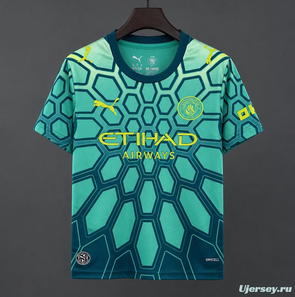 26/27 Manchester City Vibrant Green Goalkeeper Jersey With Dark Blue Geometric Pattern.